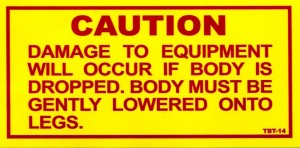 Custom Caution label manufactured from vinyl.