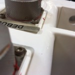 Bent aluminum labels may not adhere correctly to surfaces